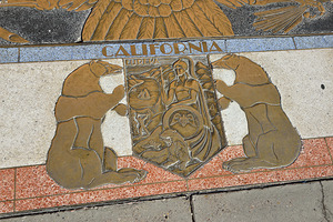 Bas relief plaque for California is inlaid into Hoover Dams plazas surface one of the seven states that fall within the Colorado Rivers basin. Hoover Dam Arizona Nevada USA by Kevin Oke