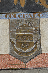 Bas relief plaque for Colorado is inlaid into Hoover Dams plazas surface one of the seven states that fall within the Colorado Rivers basin. Hoover Dam Arizona Nevada USA by Kevin Oke
