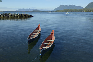 Two native canoes anchored in Tofino Harbour