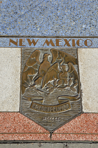 Bas relief plaque for New Mexico is inlaid into Hoover Dams plazas surface one of the seven states that fall within the Colorado Rivers basin. Hoover Dam Arizona Nevada USA Print