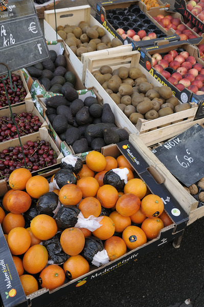 Oranges and avocados at a street market Châtillon sur Loire Centre France Print