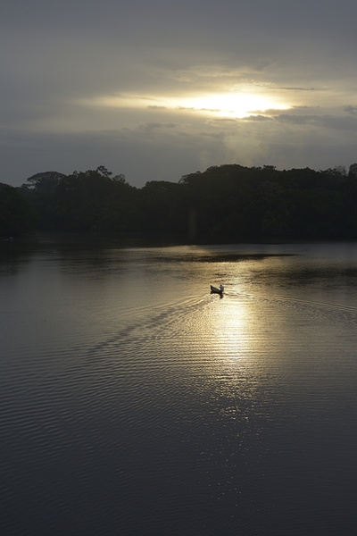 Canoeing on Lake Garzacocha at sunset La Selva Amazon Ecolodge Orellana Ecuador Print