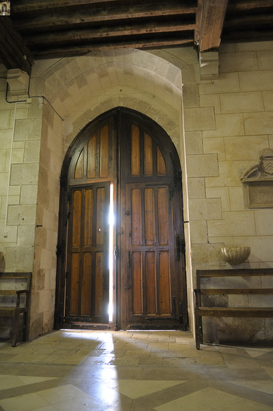 Shaft of light coming through the entrance door.  Eglise de Saint Maurice. Chatillon-sur-Loire Centre. France Print