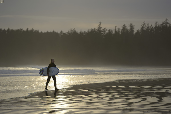 Women walking with a surfboard on Long Beach Pacific Rim National Park Print