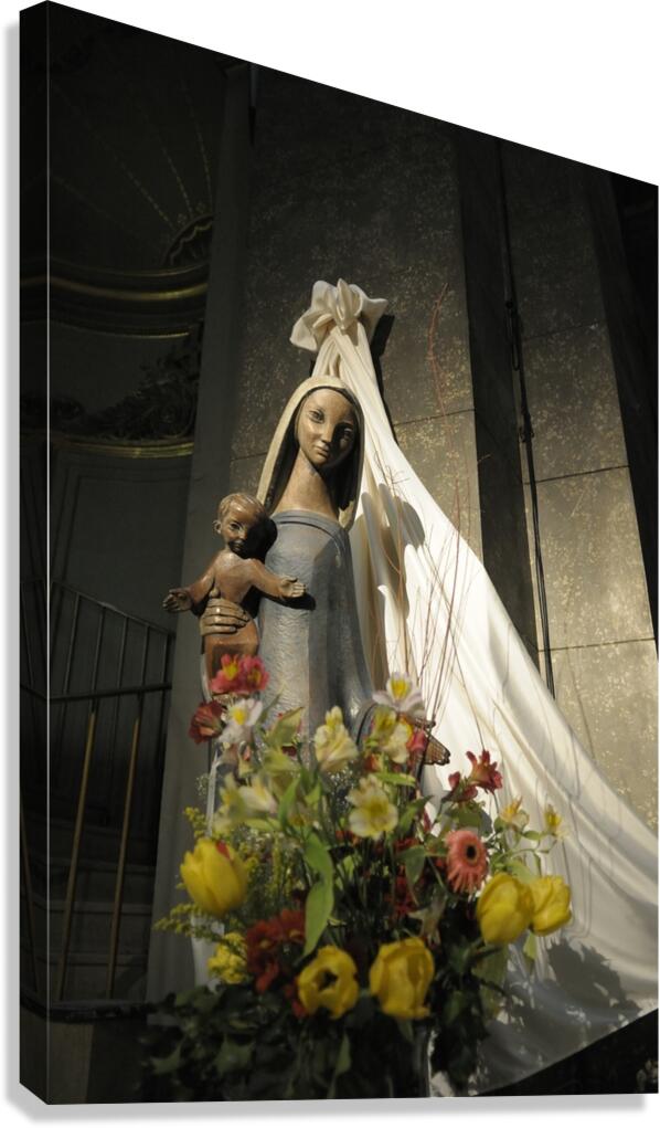 Wood carving of the virgin with bouquet of flowers Eglise Saint Pothin Canvas Print