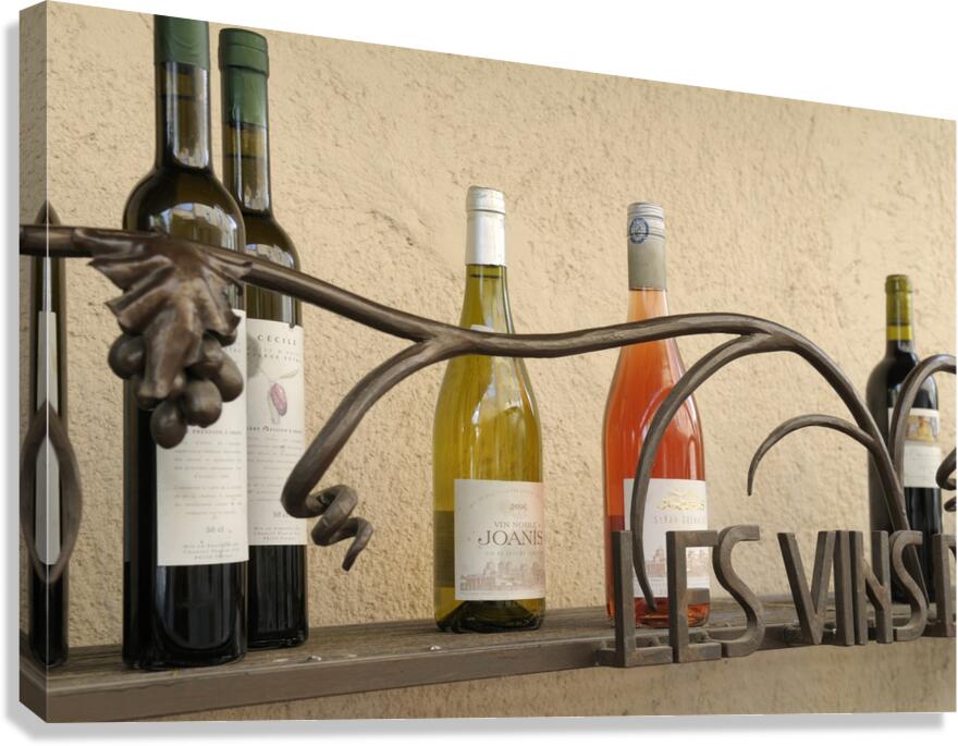Les Vins Du Luberon store sign with bottled wine Canvas Print