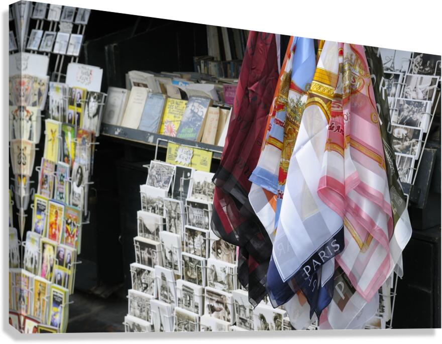 Scarves and postcards for sale on the banks of the Seine River - Paris Canvas Print