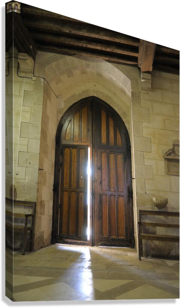 Shaft of light coming through the entrance door.  Eglise de Saint Maurice. Chatillon-sur-Loire Centre. France Canvas Print