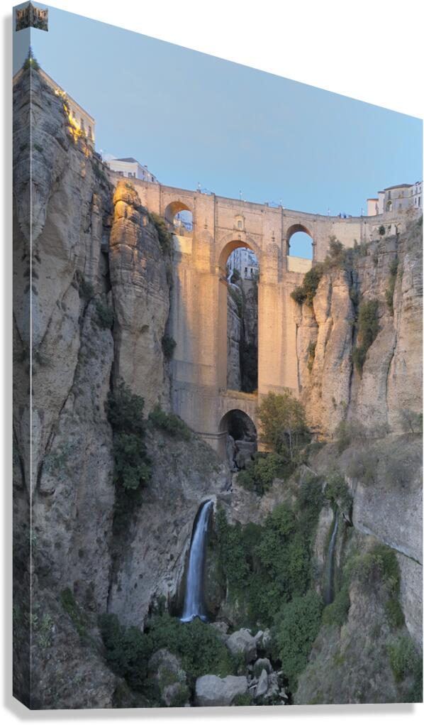 Guadalevín River and waterfall at dusk Puente Nuevo El Tajo Gorge Ronda Málaga Andalusia Spain Canvas Print