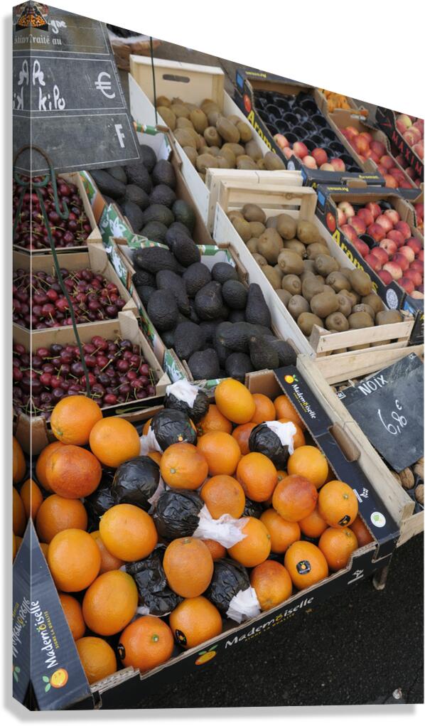 Oranges and avocados at a street market Châtillon sur Loire Centre France Canvas Print