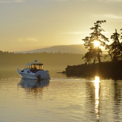 Small motor boat leaving Conover Cove