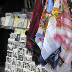 Scarves and postcards for sale on the banks of the Seine River - Paris