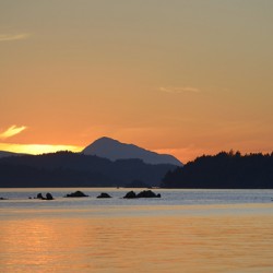 Kayakers near islets at the entrance to Princess Bay