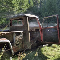 Old pickup truck with steam rising
