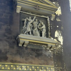 Carved crucifixion scene Eglise Saint Pothin
